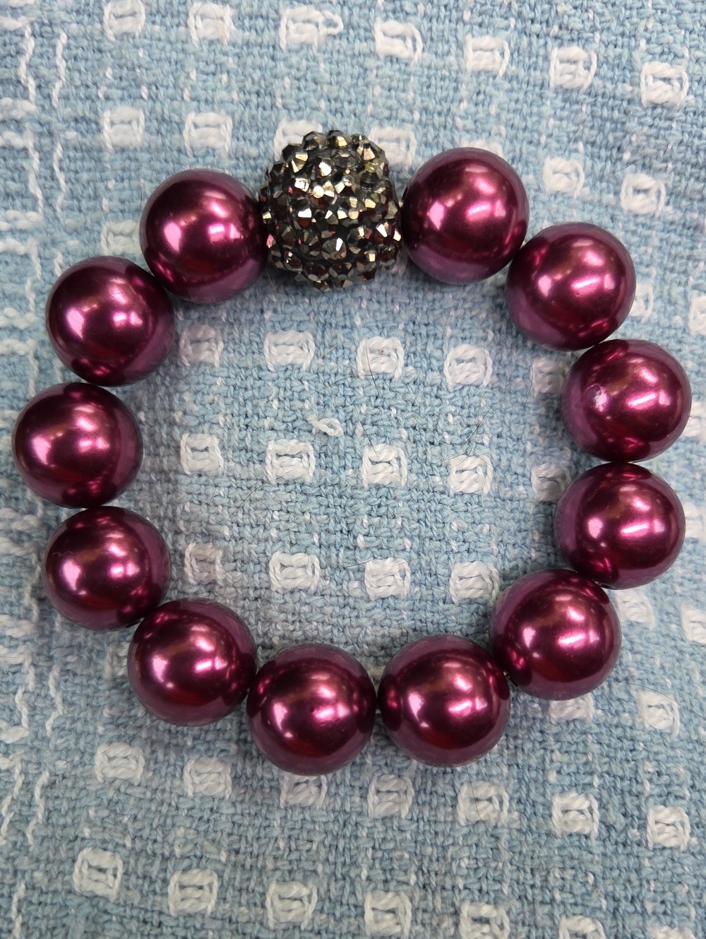 Plum/Magenta Stretch Bracelet With A Pave Crystal Rhinestone Accent Bead. NWOT.